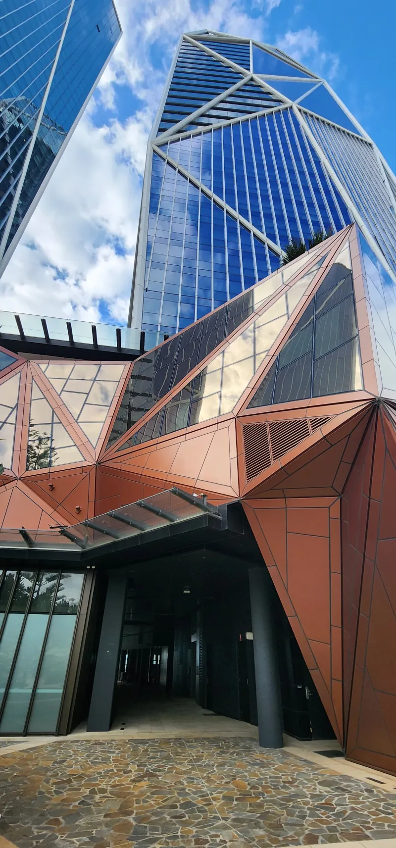 The Langham: the angular bronze faceted entrance canopy
